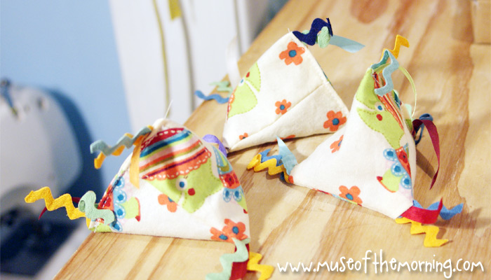 Adorable Triangle Bean Bag Tutorial written by Muse of the Morning for Fleece Fun - great toddler gift idea!