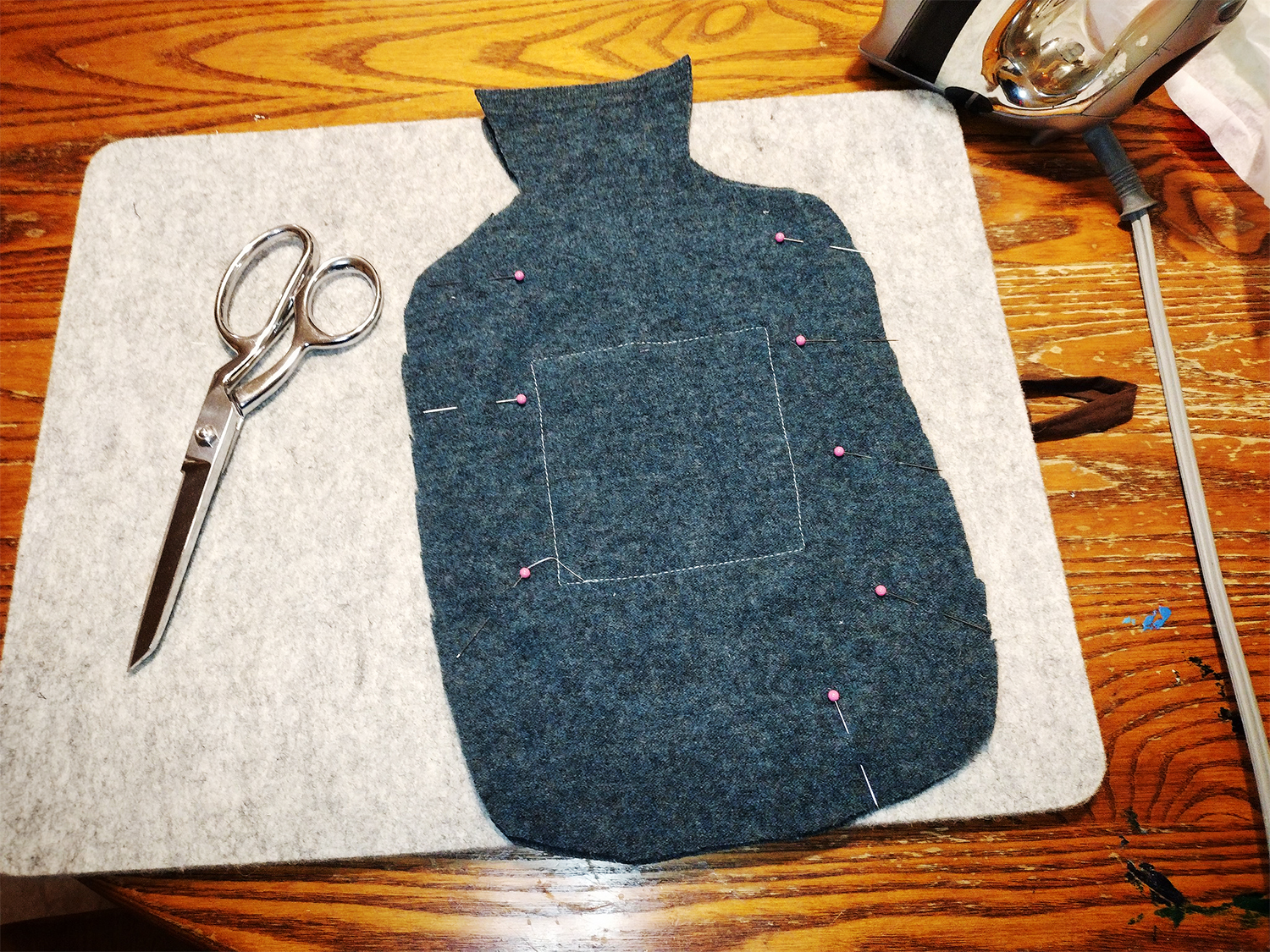 Use an upcycled wool sweater to create a hot water bottle cozy - a tutorial from Muse of the Morning